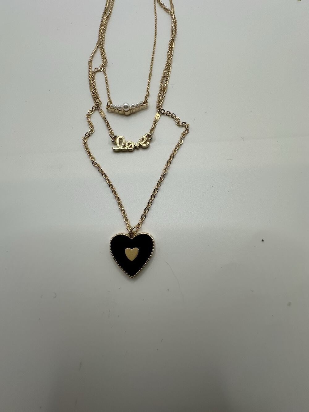 Isles & Stars Gold Tone Multi Chain Necklace W/Black Enamel Heart Faux Pearl